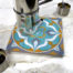 "Azulejos II" by Pauline Dubisy on ceramic trivet