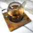 "Heating Love (Citrus)" de Yannick Pirson sur sous-plat en céramique